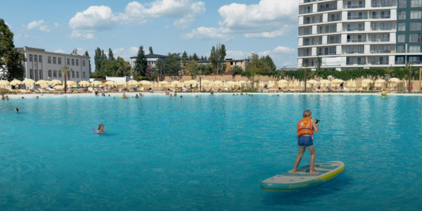 Light vert à une macro complexe avec des hôtels et une plage à Séville